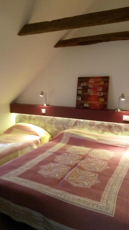 Postel nebo postele na pokoji v ubytování Hôtel Armony
