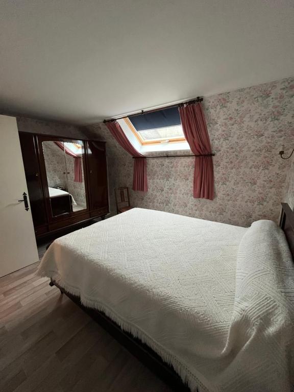 Кровать или кровати в номере LA FECAMPOISE