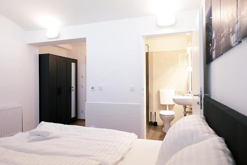Postel nebo postele na pokoji v ubytování Motel Graz Ost