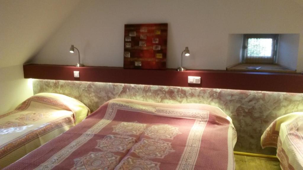Postel nebo postele na pokoji v ubytování Hôtel Armony