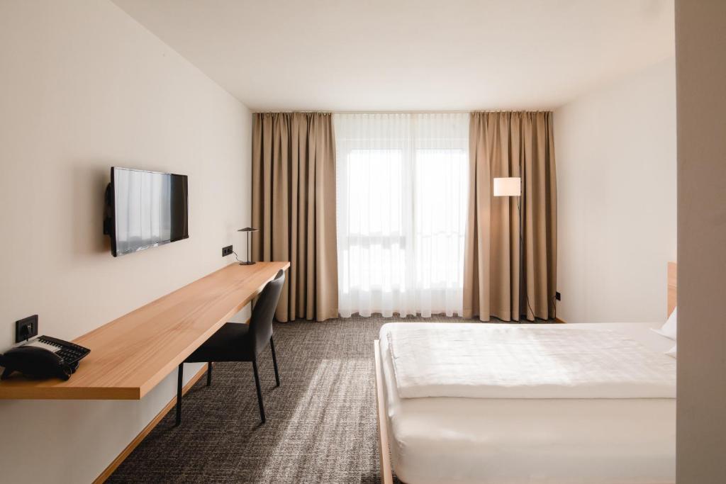 TV a/nebo společenská místnost v ubytování Hotel Krone