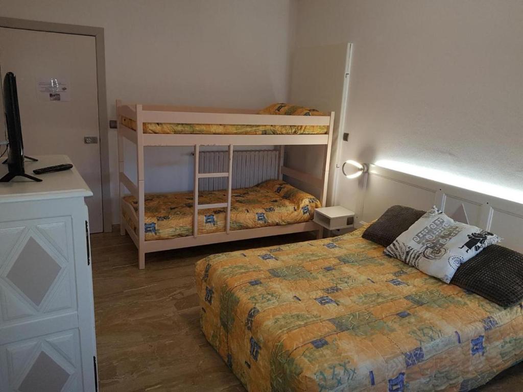 Postel nebo postele na pokoji v ubytování Hôtel Armony