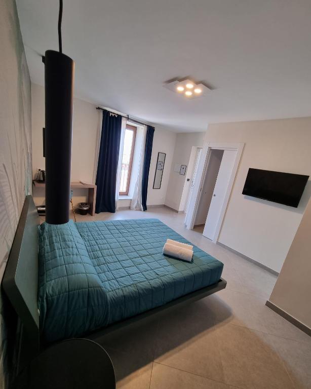 Postel nebo postele na pokoji v ubytování Margiò House