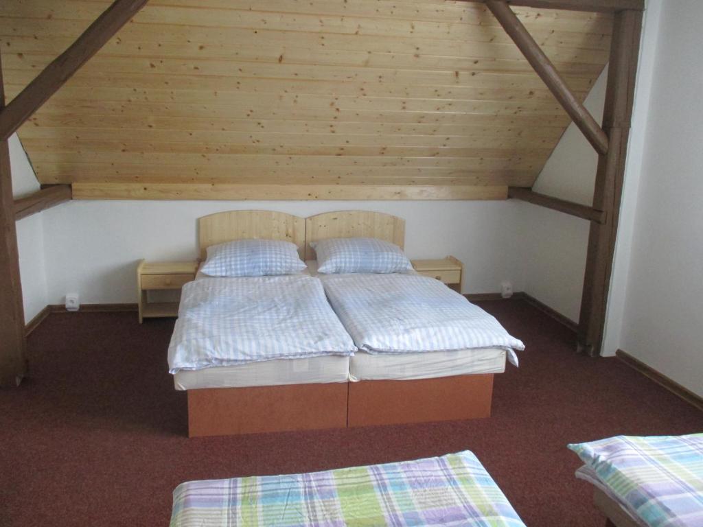 Postel nebo postele na pokoji v ubytování Dům Hana