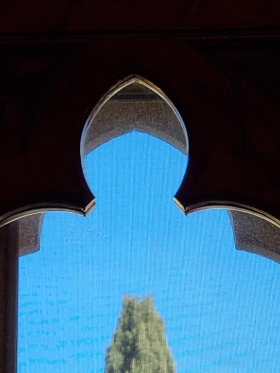 a view of the sky through a window at B&B Firenze 400 in Florence