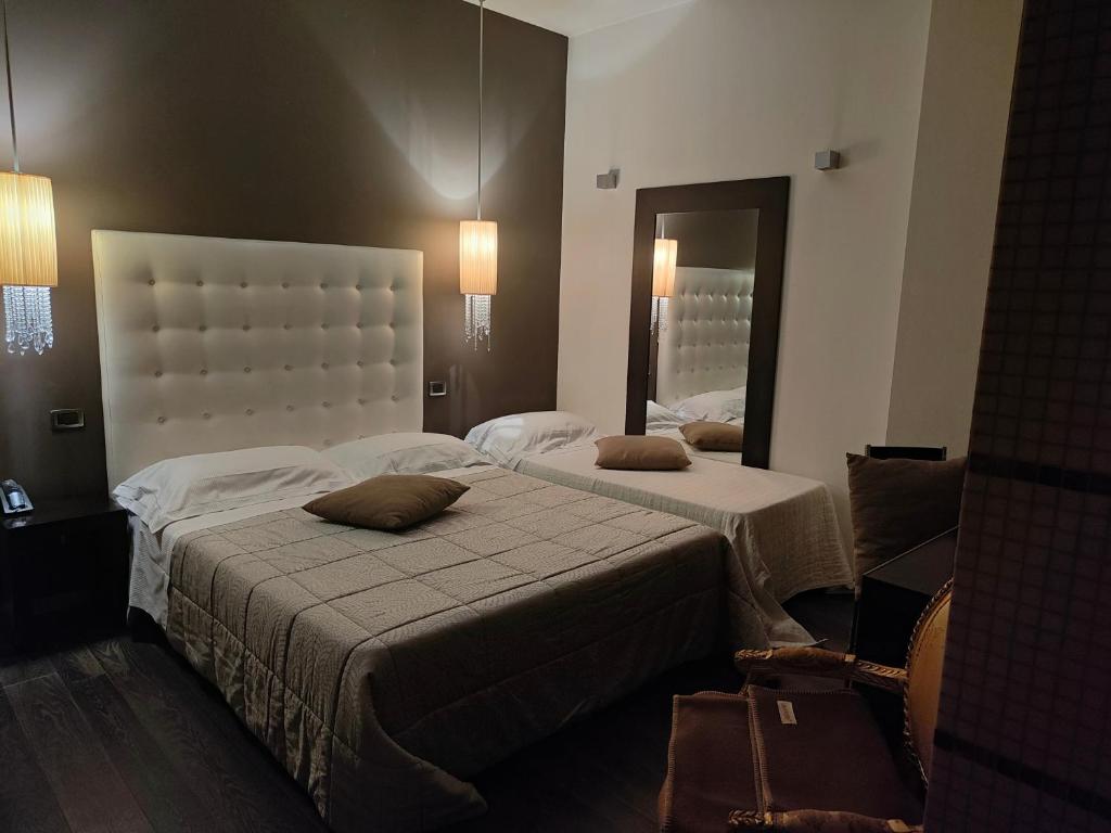 Postel nebo postele na pokoji v ubytování Hotel In - Lounge Room