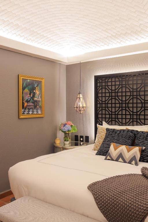 Postel nebo postele na pokoji v ubytování Hotel Casamada