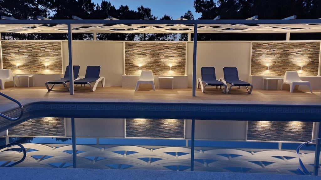 Bazén v ubytovaní Hotel Cachada alebo v jeho blízkosti