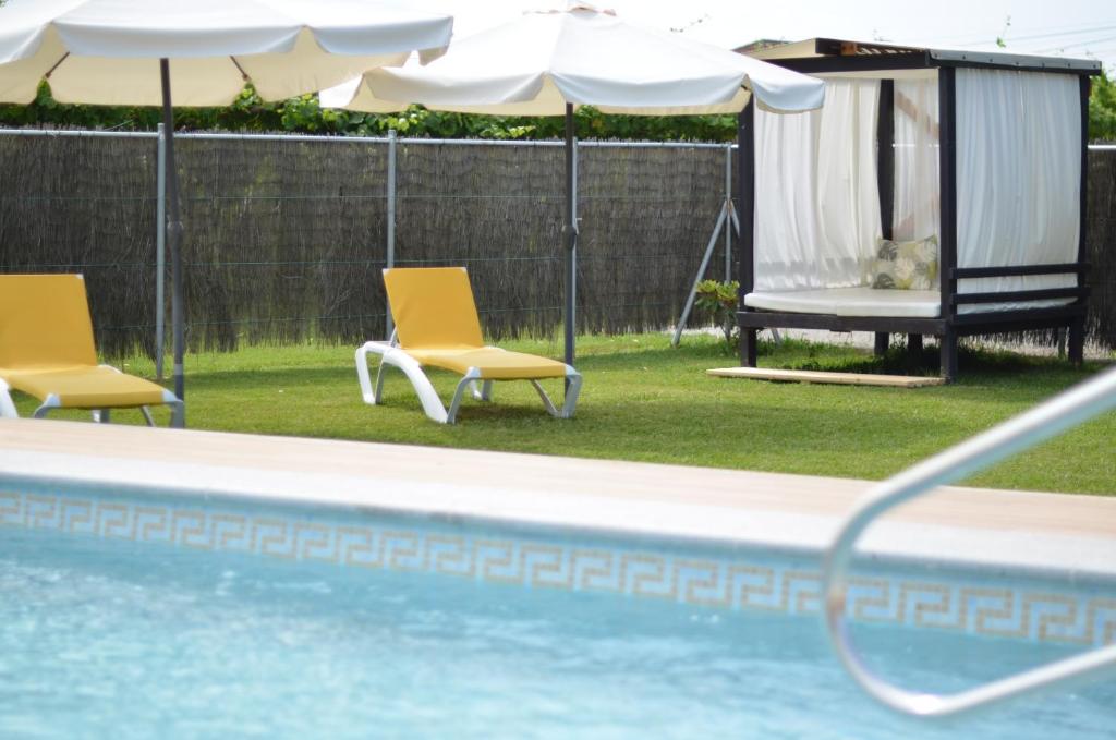 Bazén v ubytovaní Hotel Cachada alebo v jeho blízkosti