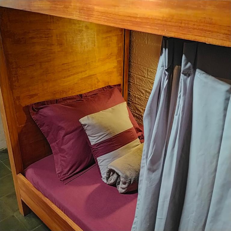 Postel nebo postele na pokoji v ubytování SEMERU HOSTEL MALANG