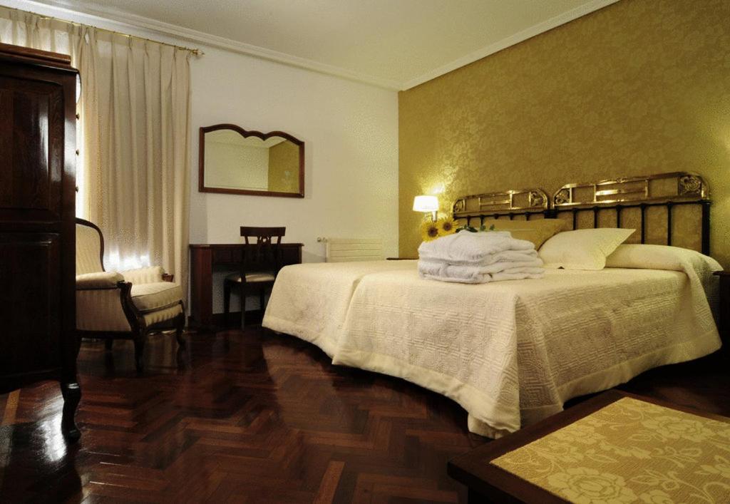 Postel nebo postele na pokoji v ubytování Hotel II Virrey