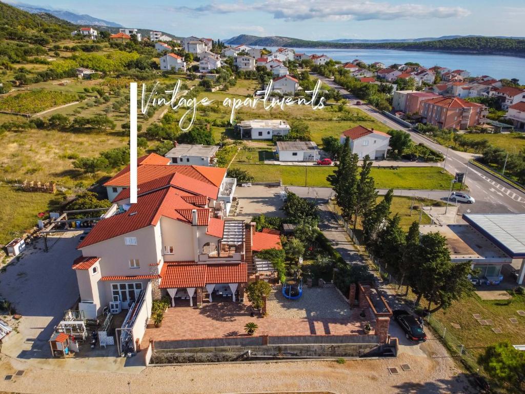 an aerial view of a house with an orange roof at Apartments Vintage in Banjol