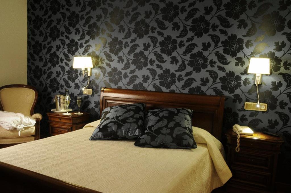 Postel nebo postele na pokoji v ubytování Hotel II Virrey
