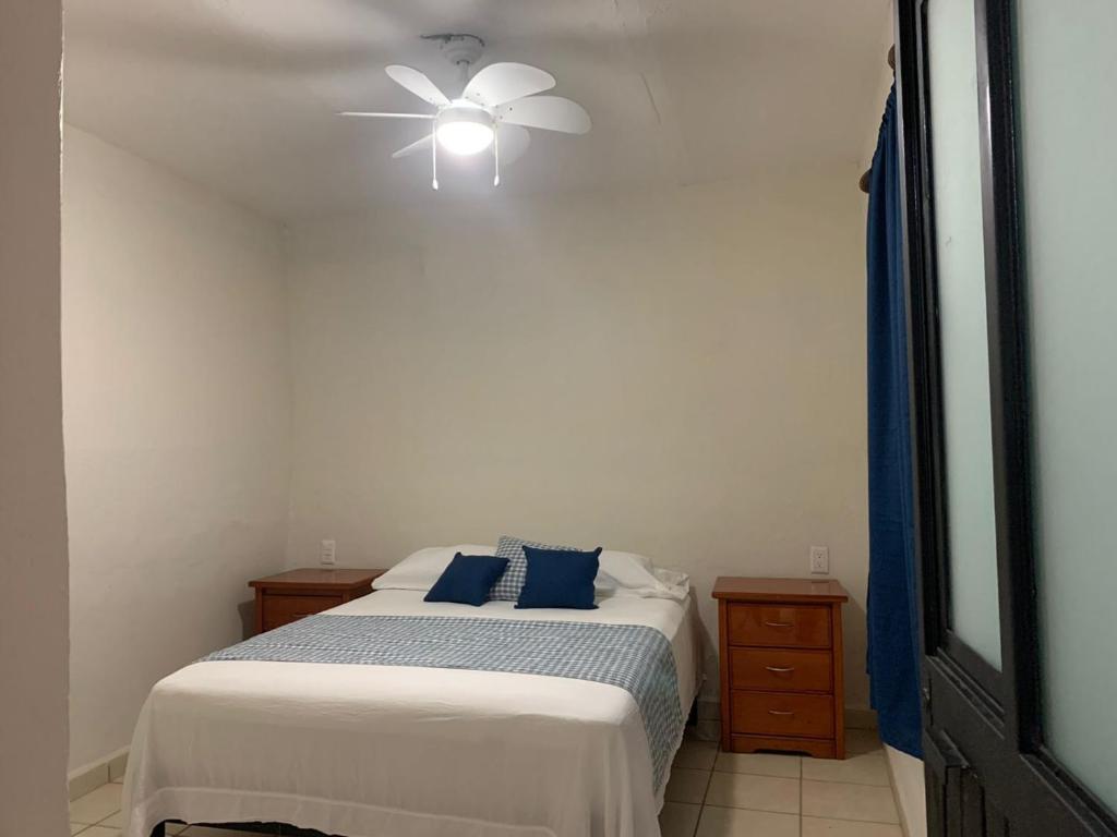 Postel nebo postele na pokoji v ubytování Posada San Jose - Tequila Centro