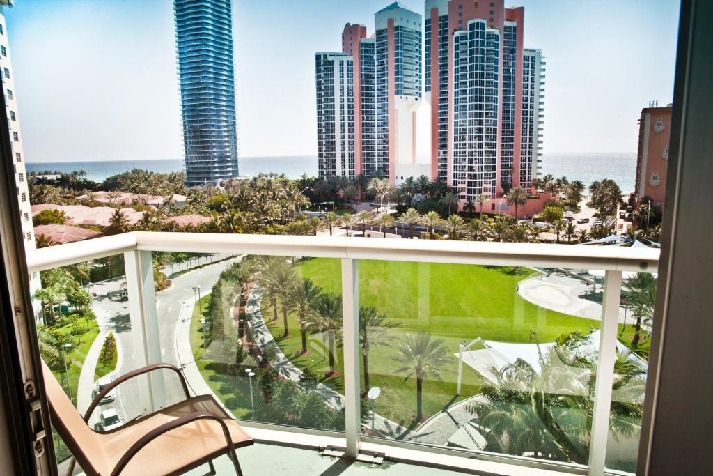 a balcony with a view of the city at Ocean Reserve Condo by FlatsAway in Miami Beach