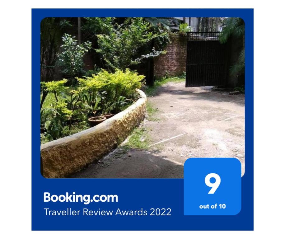 zdjęcie ogrodu z numerem na zrzucie ekranu w obiekcie Garden Central - 2 Bedroom Apartment, Siliguri w mieście Siliguri