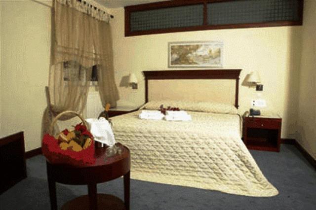 Postel nebo postele na pokoji v ubytování Crithoni's Paradise Hotel