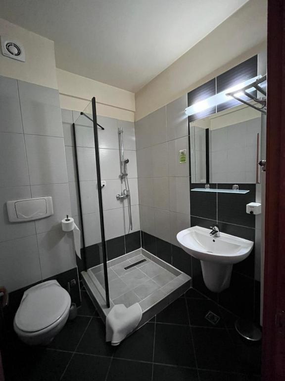 Koupelna v ubytování Hotel Seven