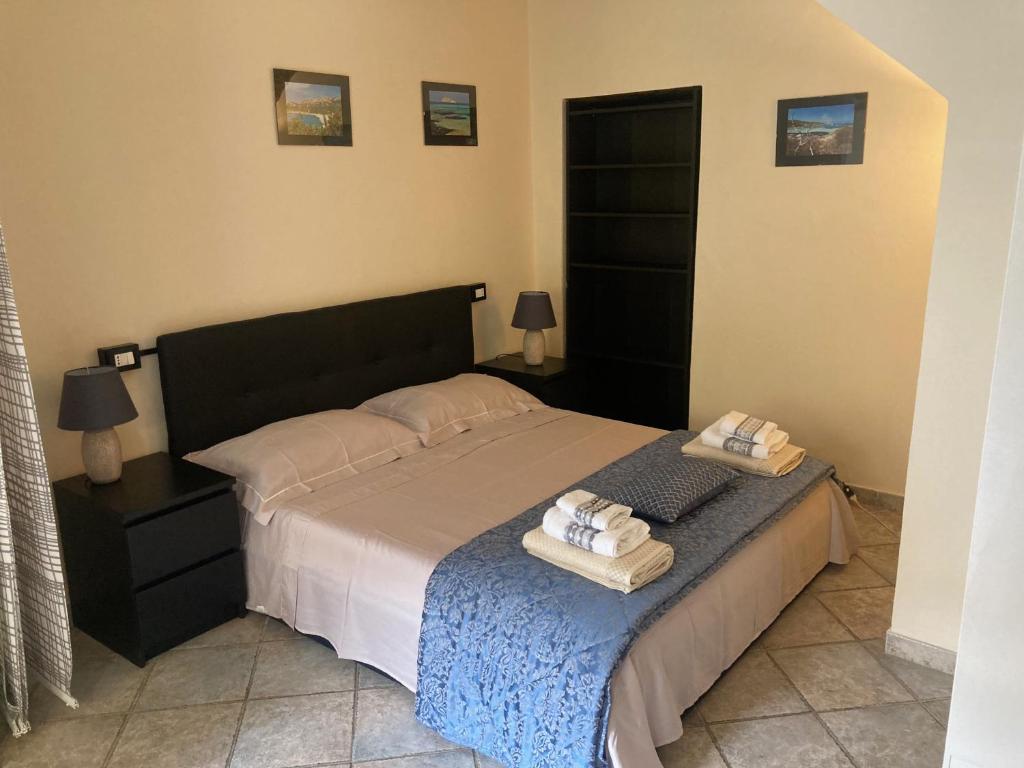 Postel nebo postele na pokoji v ubytování Great studio apartment in the heart of Chianni