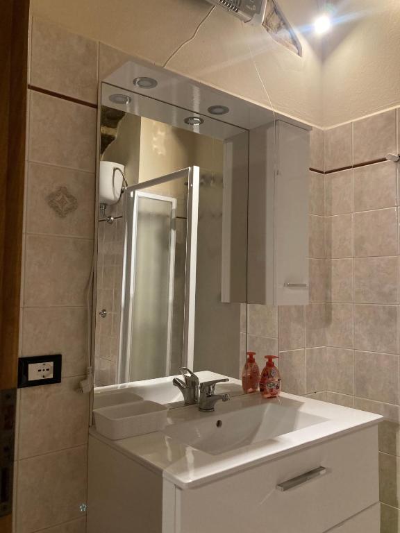 Koupelna v ubytování Great studio apartment in the heart of Chianni