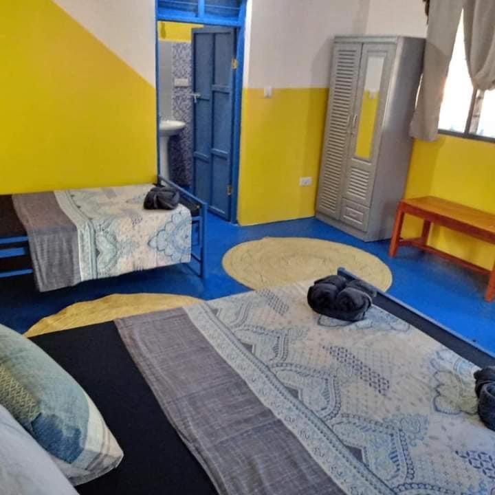 Postel nebo postele na pokoji v ubytování Furaha B&B Kendwa