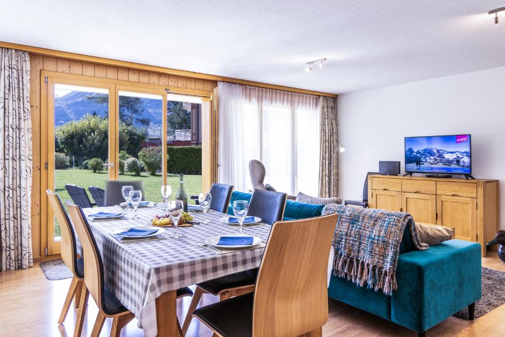 TV a/nebo společenská místnost v ubytování Chalet Aquila 2