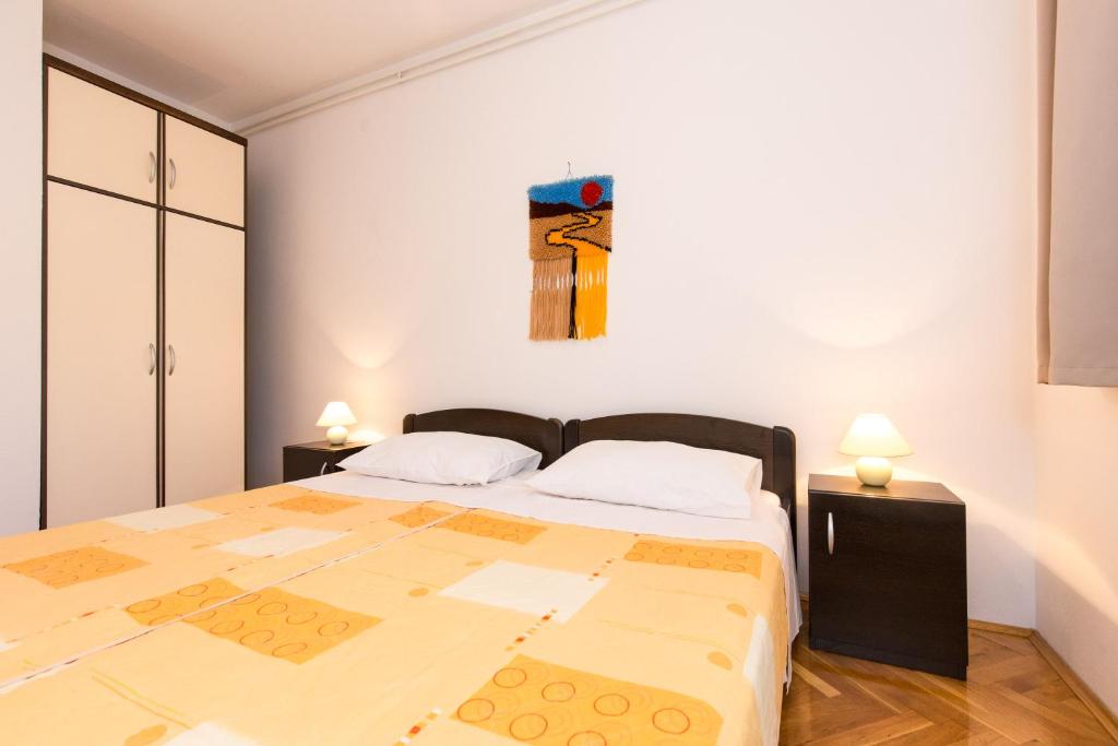 Postel nebo postele na pokoji v ubytování Lana