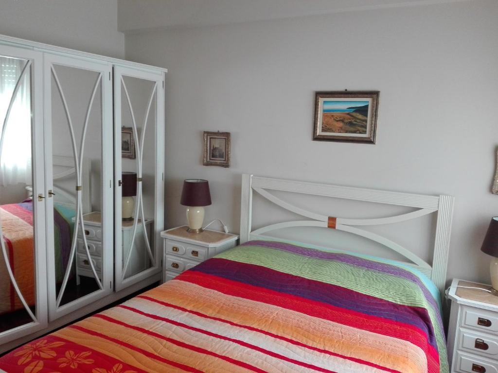 Katil atau katil-katil dalam bilik di Apartamento Gonçalves