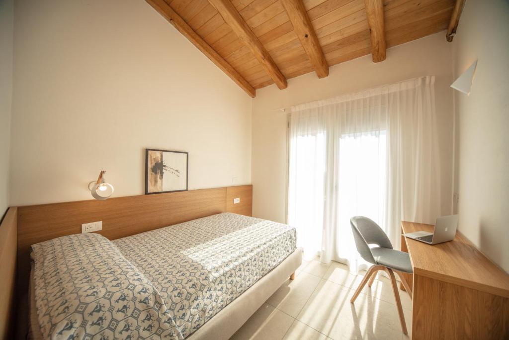 Postel nebo postele na pokoji v ubytování Domu Simius Life Style Hotel
