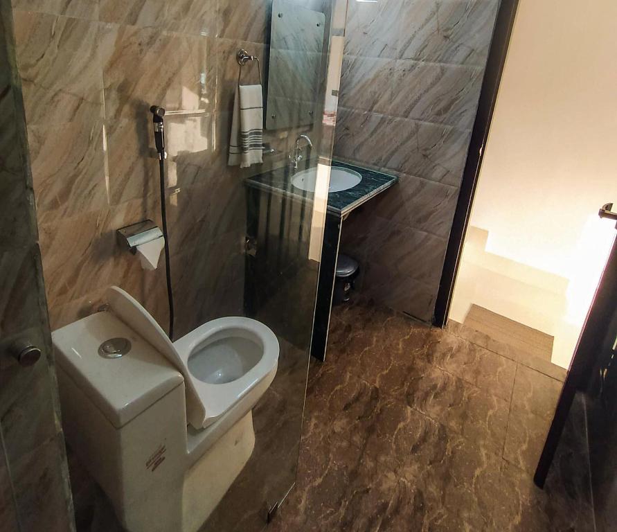 Anugraha Homestay - Deluxe Double Room (2 Adults + 1 Child)