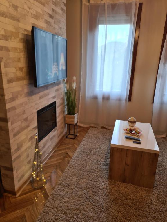 TV a/nebo společenská místnost v ubytování Happy Moments