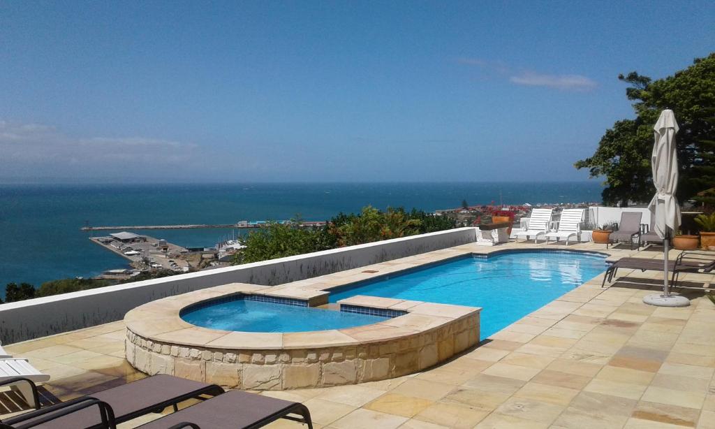 a swimming pool on the roof of a building at Lavandula Manor Self-Catering in Mossel Bay
