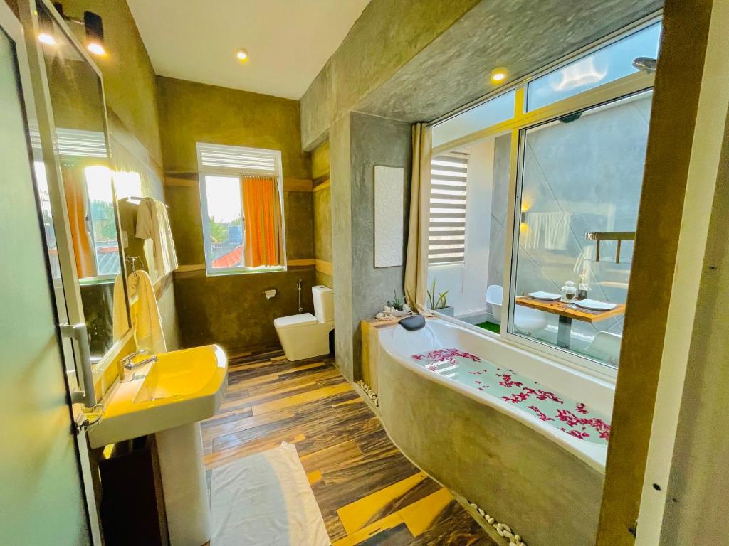 Koupelna v ubytování 8 Plus Motels