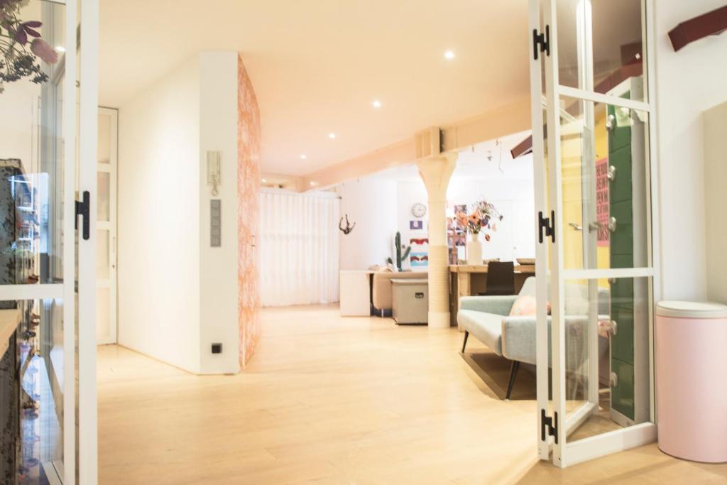 a living room with a view of a living room at Flo's Atelier - Family studio NOTE studio is adjacent to Flo's apartment in Amsterdam