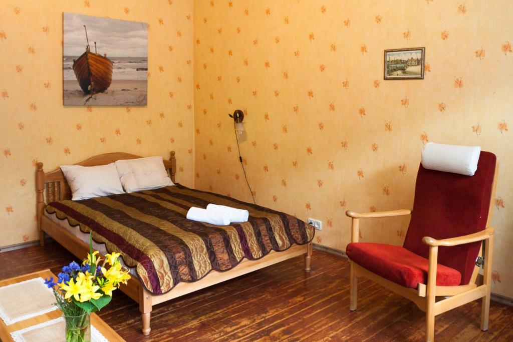 Säng eller sängar i ett rum på Pumpura apartamenti