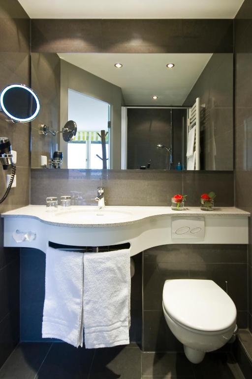 Koupelna v ubytování Hotel Viva Sky
