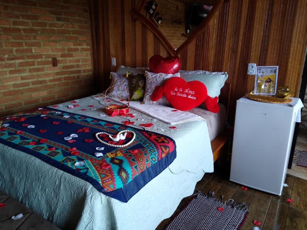 Postel nebo postele na pokoji v ubytování Pousada Rancho da Montanha