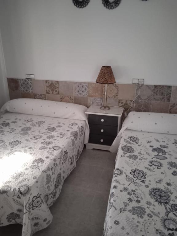 Postel nebo postele na pokoji v ubytování Vivienda uso turistico Los Nogales