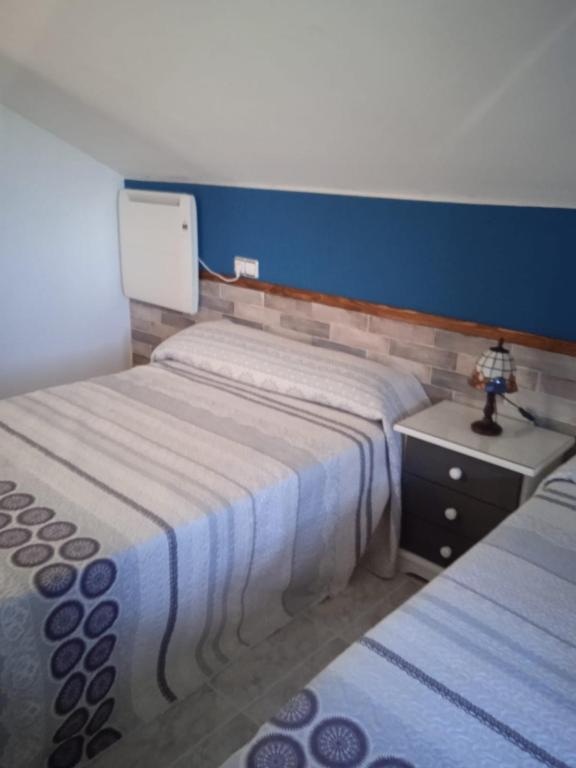 Postel nebo postele na pokoji v ubytování Vivienda uso turistico Los Nogales