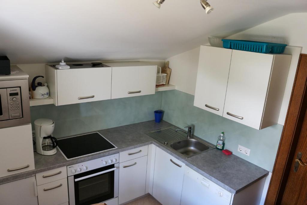 Kuchyň nebo kuchyňský kout v ubytování Haus Alpina