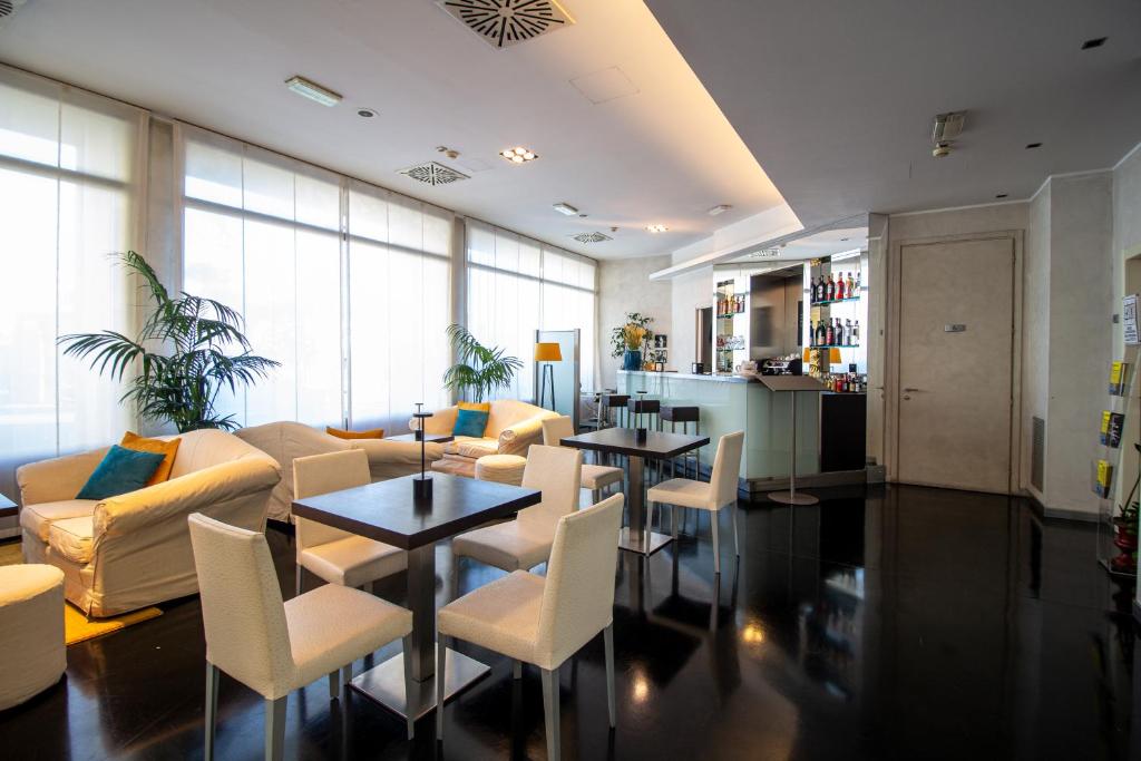 Posezení v ubytování Hotel Cavour by LVG Hotel Collection