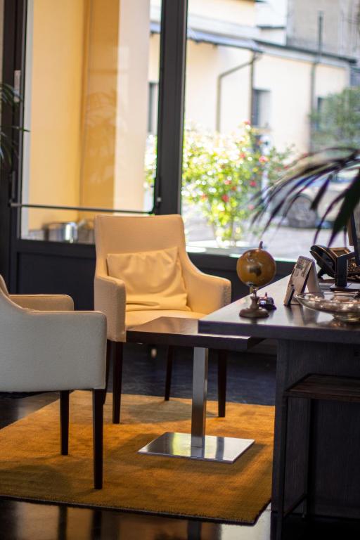 Posezení v ubytování Hotel Cavour by LVG Hotel Collection