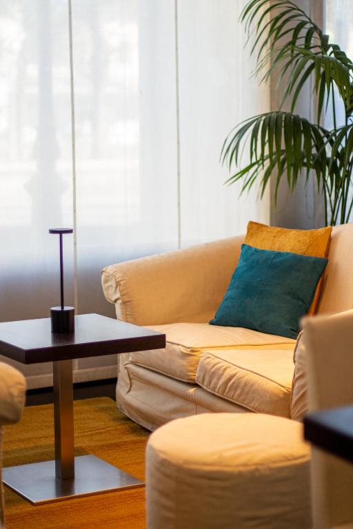 Posezení v ubytování Hotel Cavour by LVG Hotel Collection