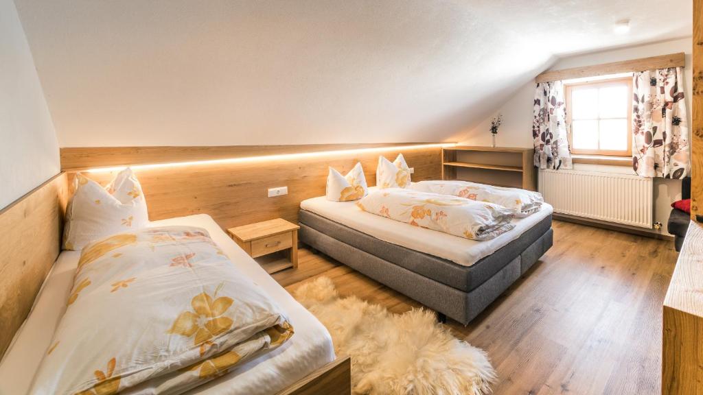 Letto o letti in una camera di Gasthof Neuwirt