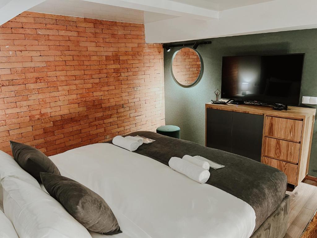 Postel nebo postele na pokoji v ubytování Luxury Duplex Suites - City Center