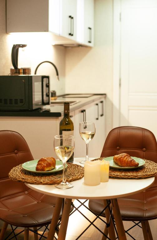 Kuchyň nebo kuchyňský kout v ubytování Luxury Duplex Suites - City Center