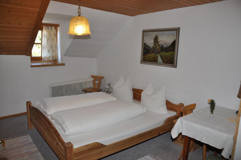 Letto o letti in una camera di Gasthof Neuwirt