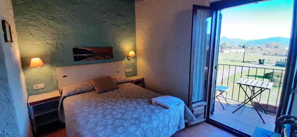 Postel nebo postele na pokoji v ubytování EcoHotel Rural Angiz