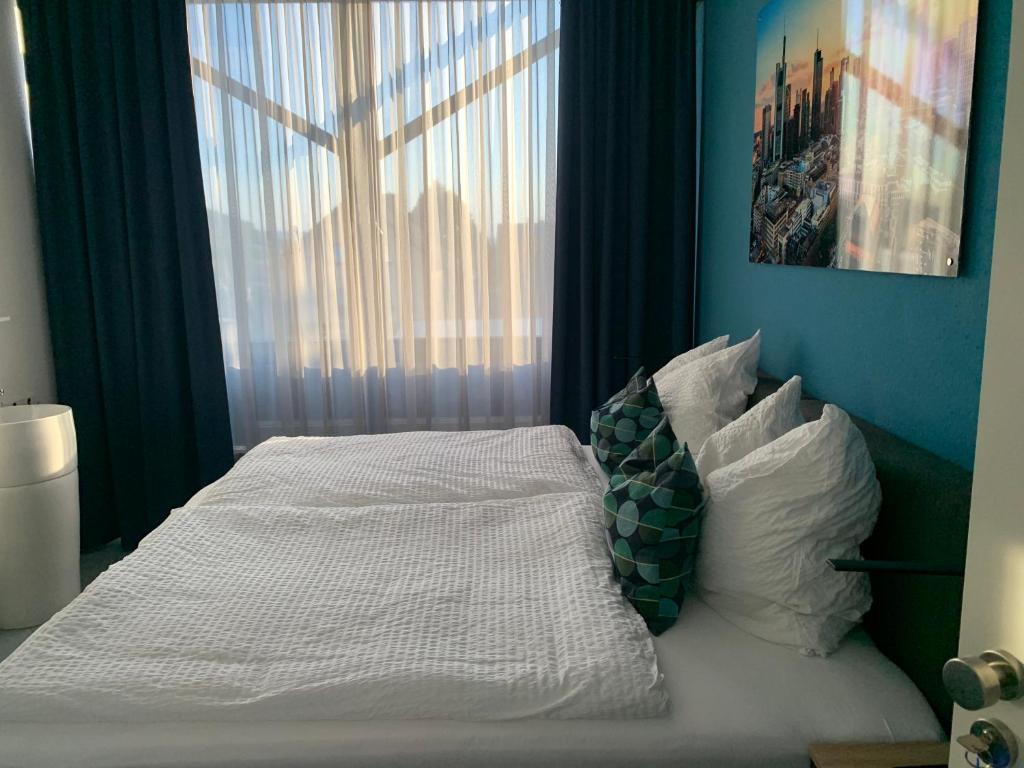 Postel nebo postele na pokoji v ubytování Argenta Living 131