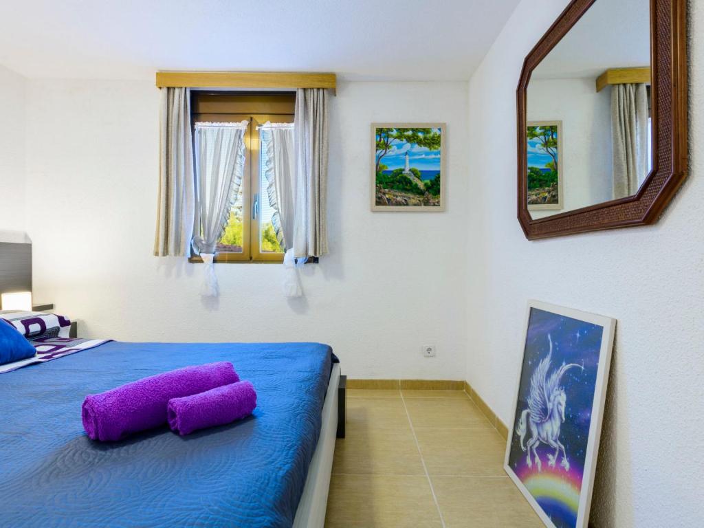 Posteľ alebo postele v izbe v ubytovaní Apartment El Refugio II by Interhome